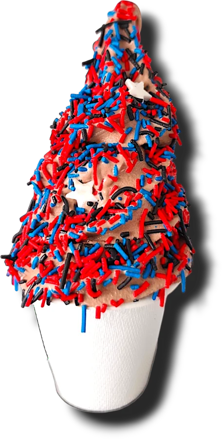 SNO FLO hero ice cream — soft serve cone coated in red and blue sprinkles